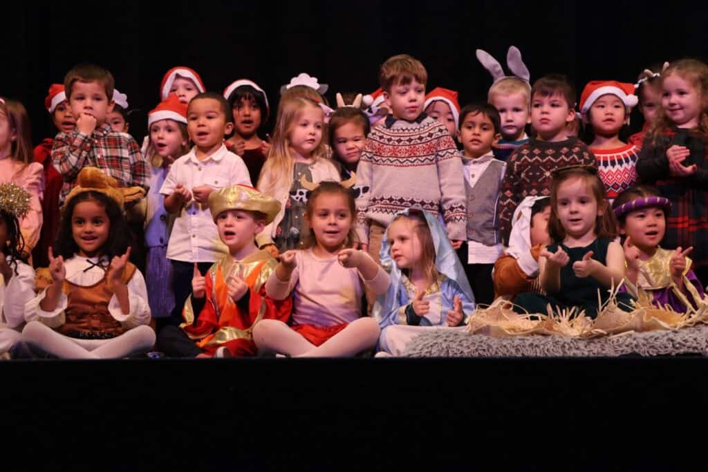 VCELS kids dressed up in nativity scene costumes for a christmas performance