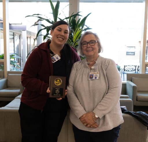 Maryville's Amy Phillips and Patti Garibaldi are all smiles at Amy's employee of the month ceremony.