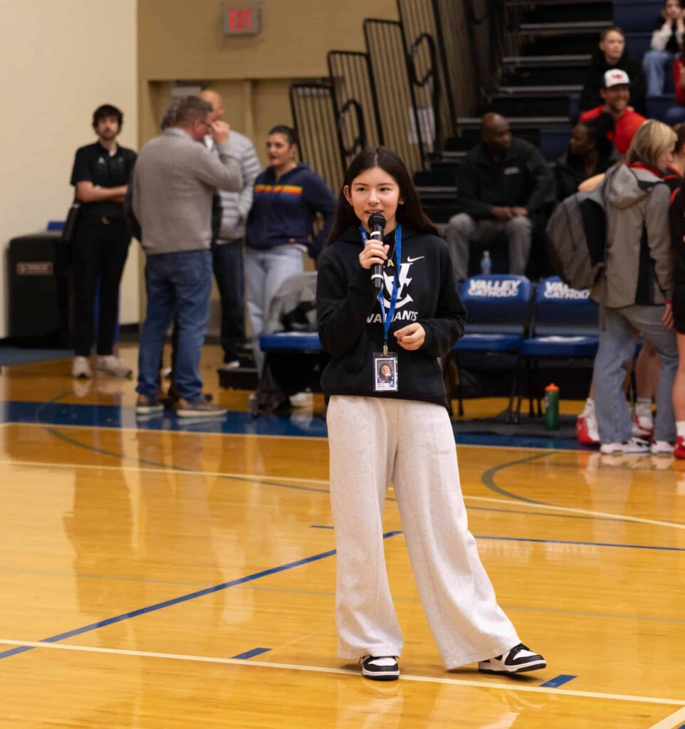 5th grader Avery M m.c'ing the game for the evening