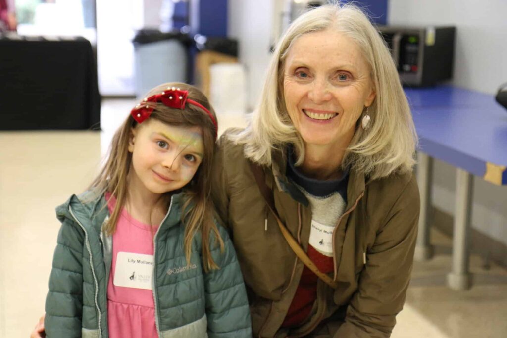 SMV/VCS alumni with family connecting before the VCS spring musical