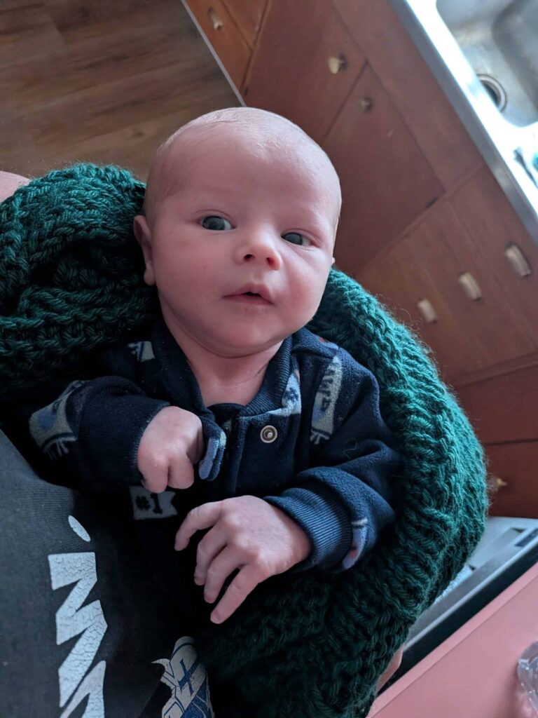 John "Jack" Michael Haugen in a green blanket