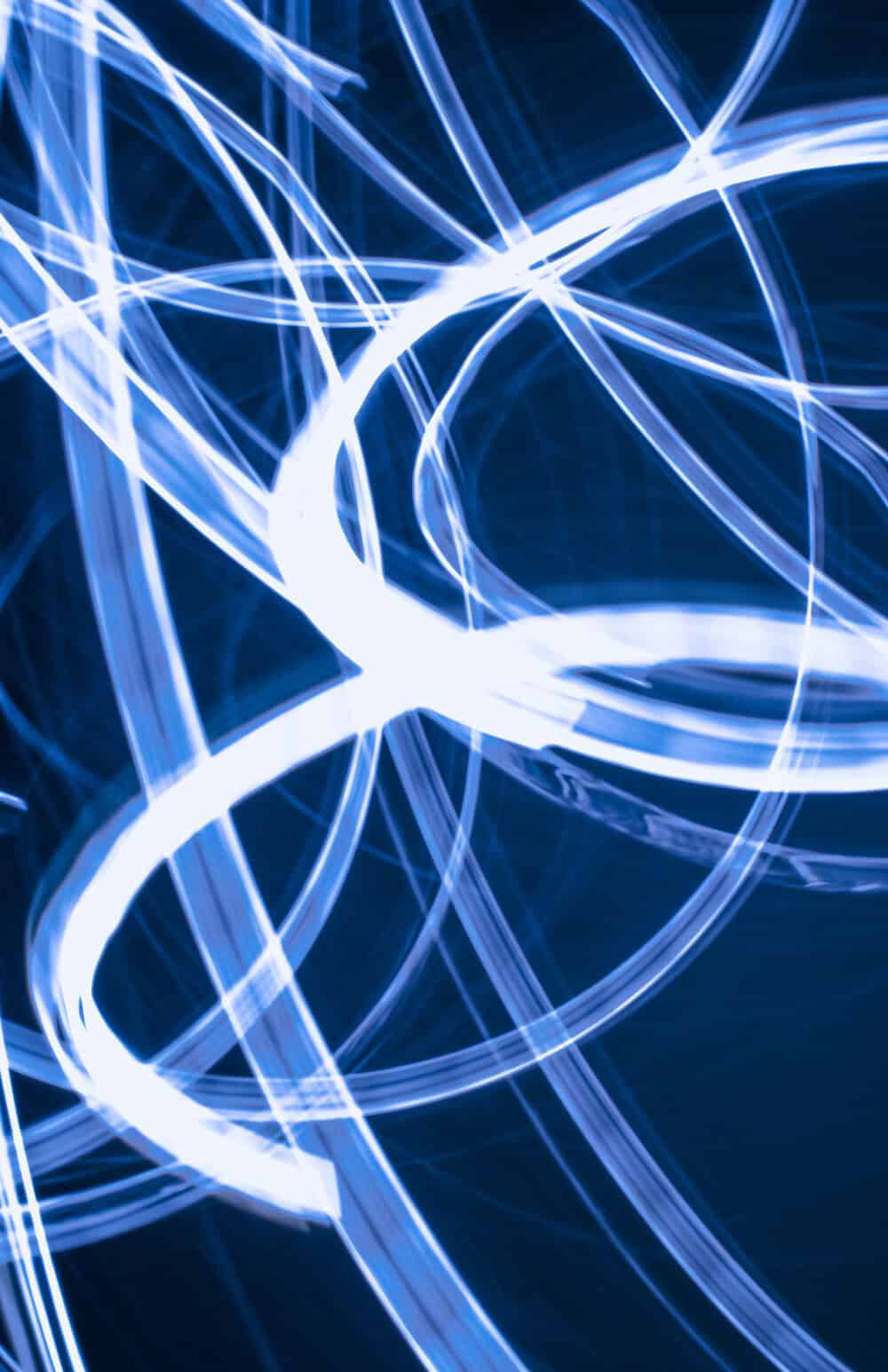 Gala poster competition shows swirls of white light on a dark blue backdrop