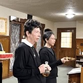 Sisters offering Mass