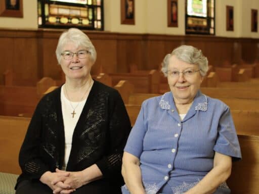 Jubilee 2026 Srs. Josephine and Ruth Frank sitting together on a pew