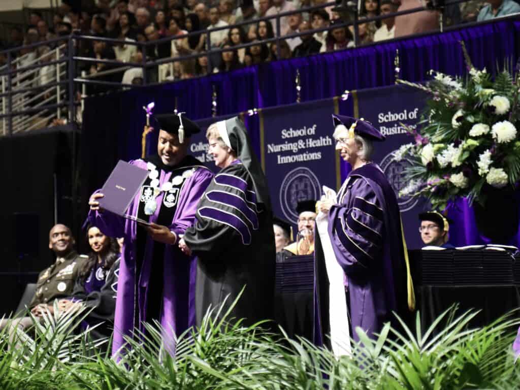 UP president kelly shows degree to sister adele marie