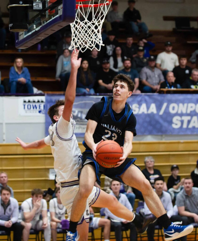 Boys Basketball Championship, VC player jumping