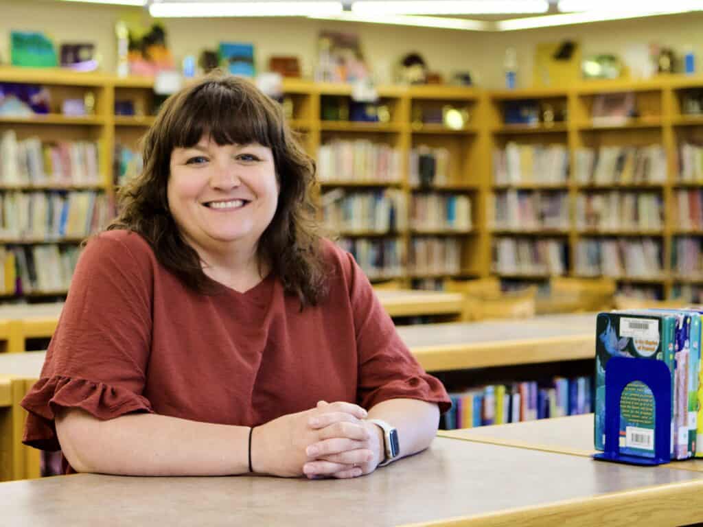 Krista Gram VCHS Principal in the library