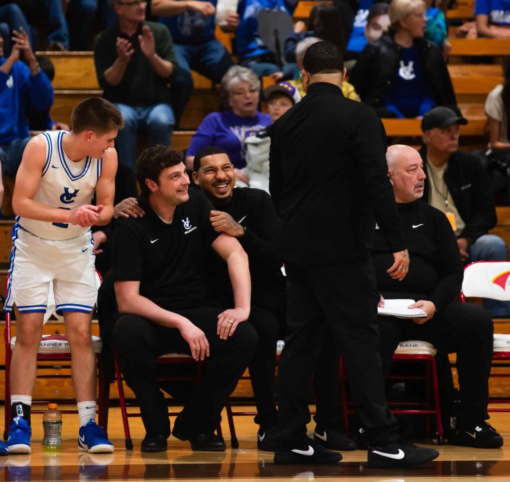 VCHS Boys Basketball Championship game; coaches and player on sideline