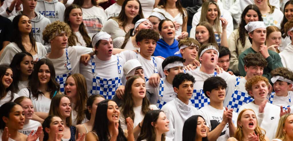 Blue Crew Cheers on basketball