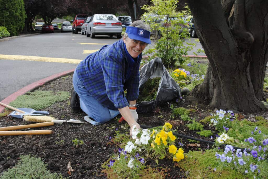 Sr. Marianne Planting flowers