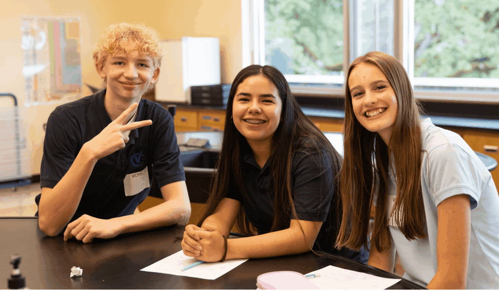 VCS First Week of School, classmates gathered at table
